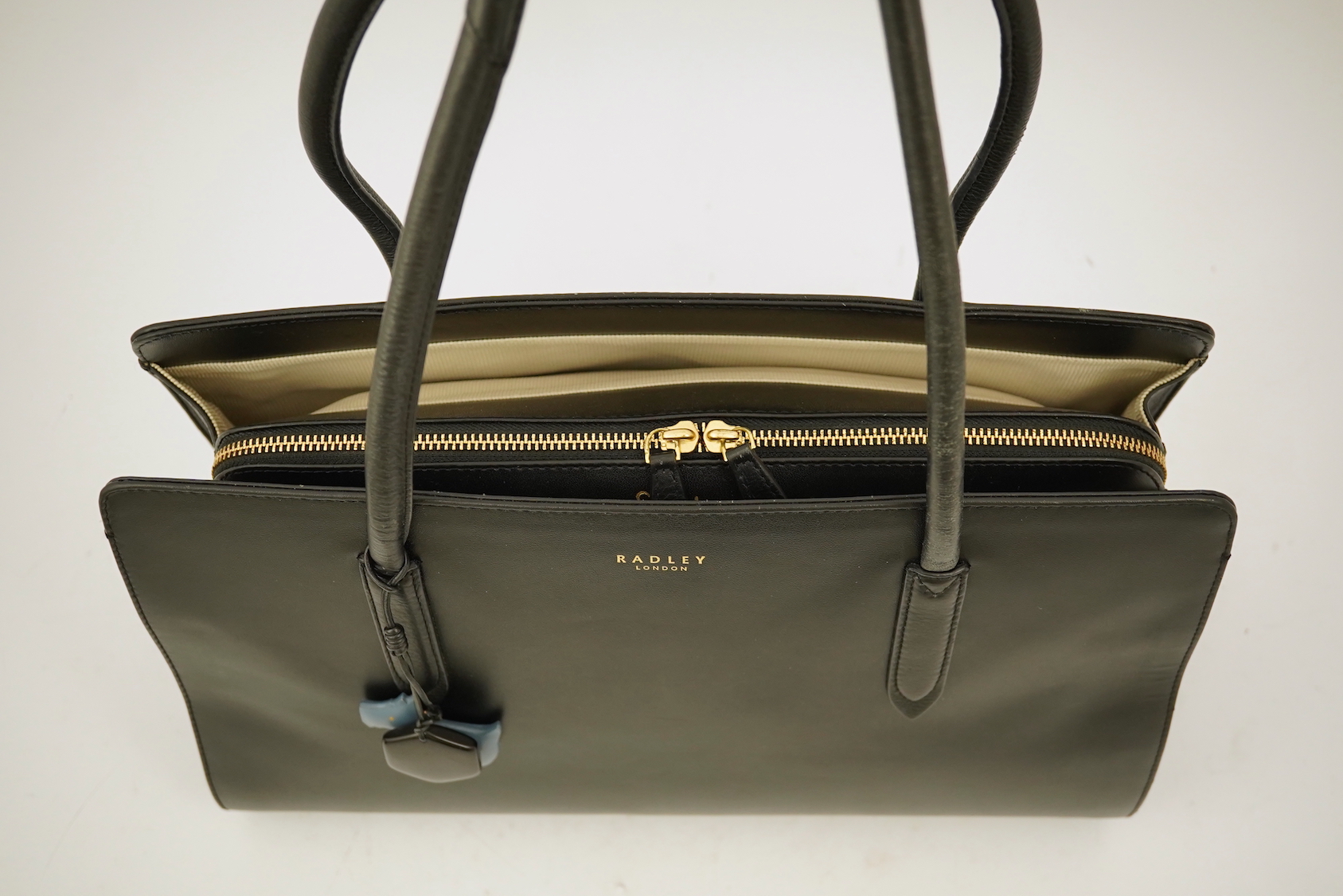 A Radley black leather shoulder bag